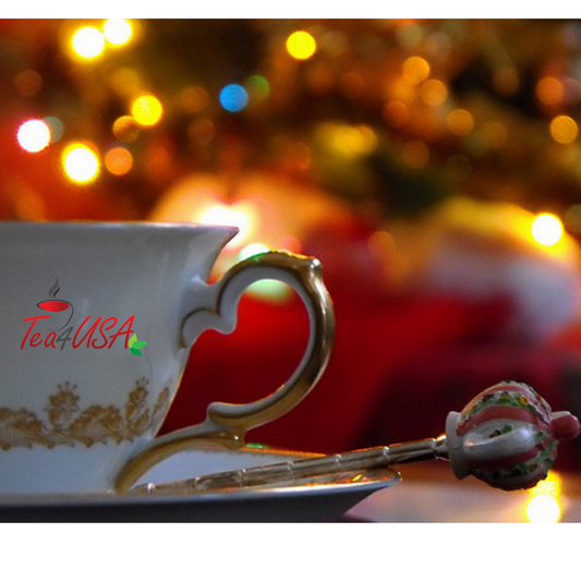 Tea4usa cup in front of Holiday lights